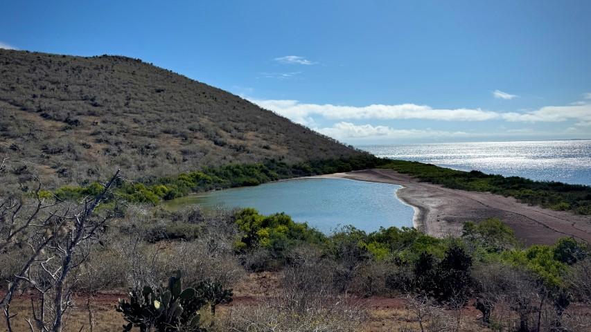 Lagoon and beach between hills by the sea