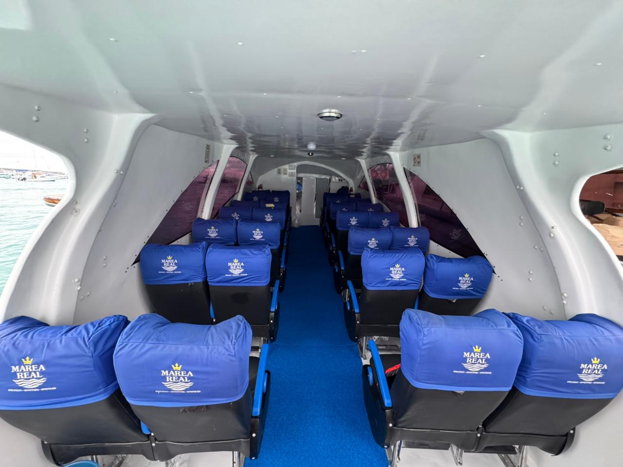Covered cabin with padded seats on the Marea Real